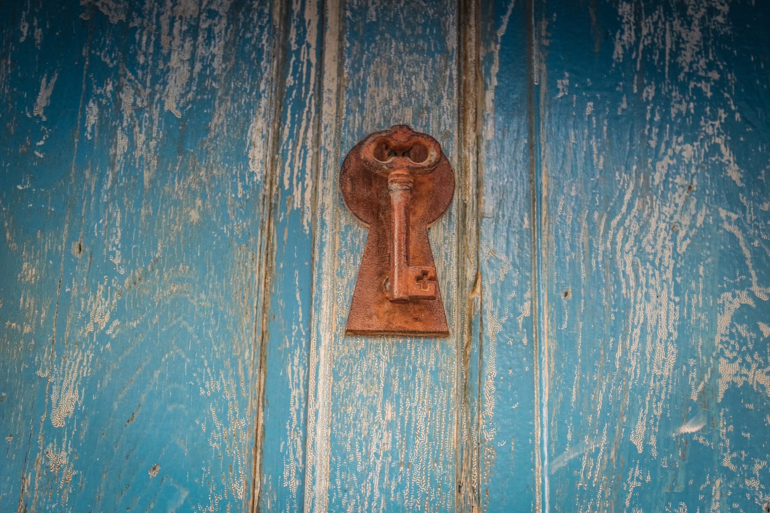 blue door with key
